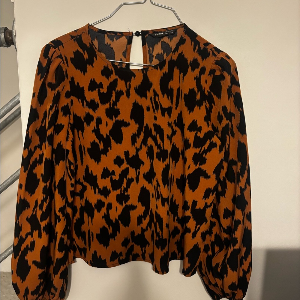 Elegant office blouse, cheetah pattern